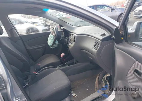 2009 Kia Rio Lx z USA, uszkodzony, nr VIN KNADE223396518858